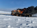 Автогрейдер загорелся на автозимнике «Якутск — Нижний Бестях»